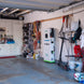 Scene 
Garage with tools, equipment, and a charging station.
